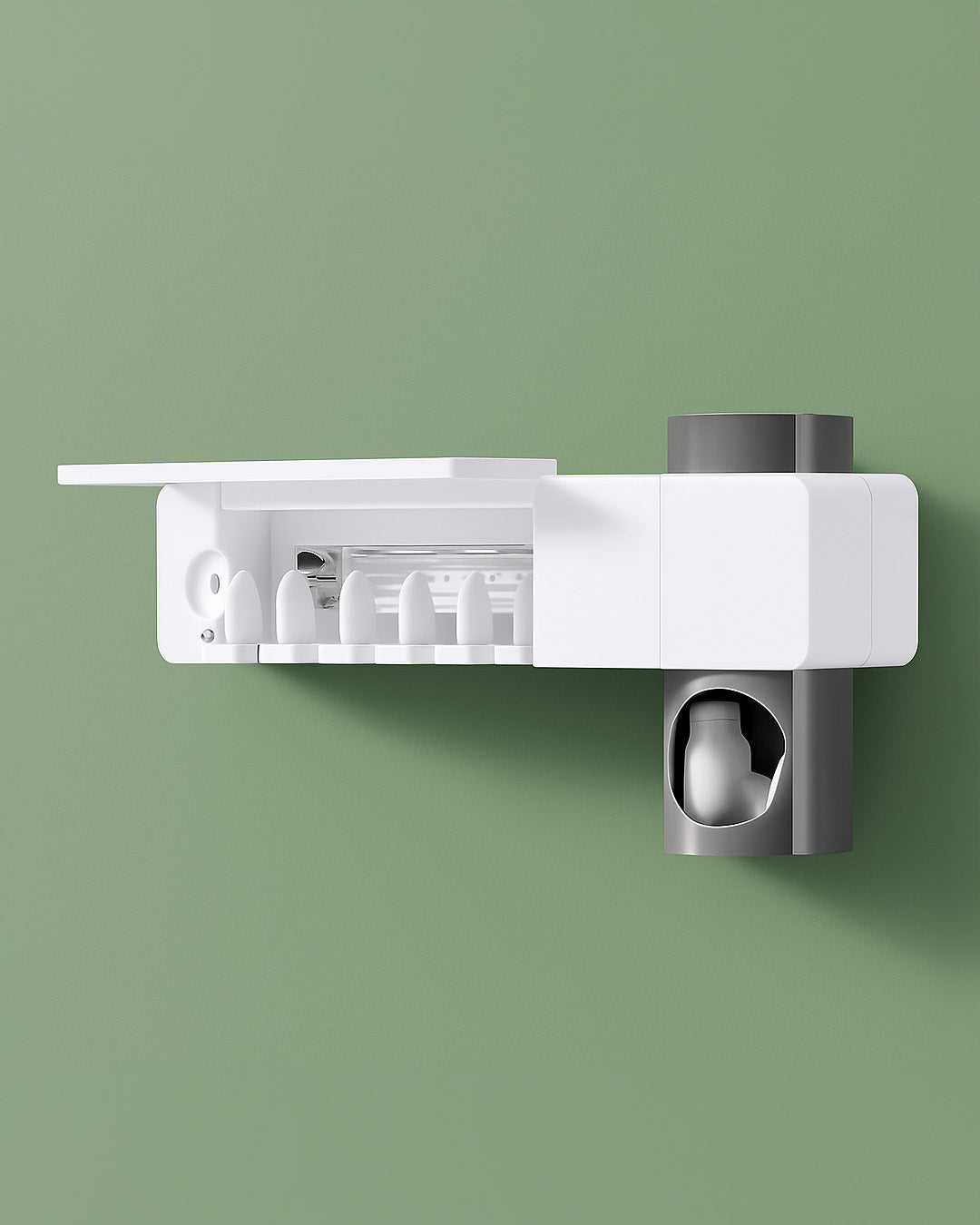 Automatic toothbrush steriliser mounted to a sage bathroom wall