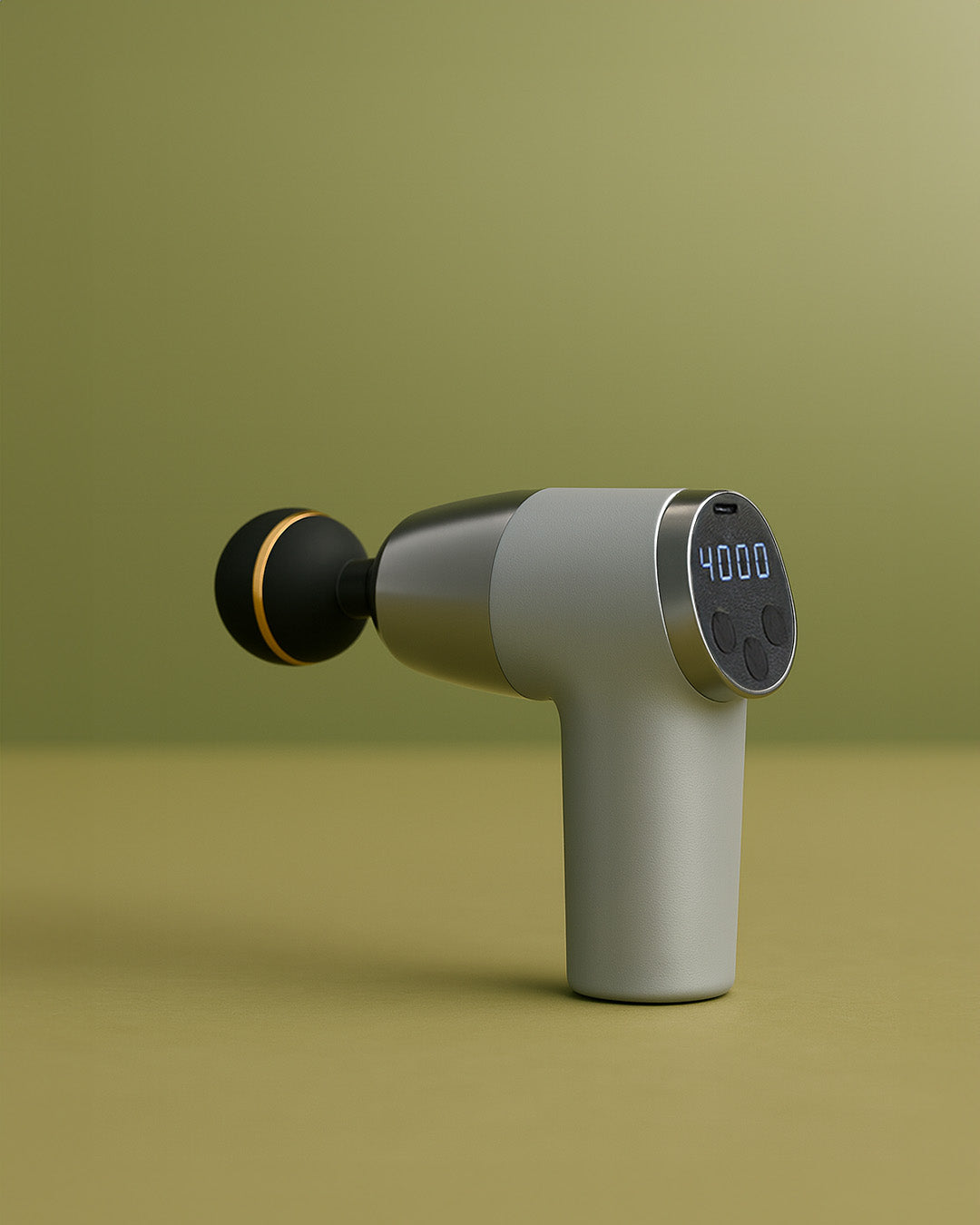 Grey Massage gun on a green background