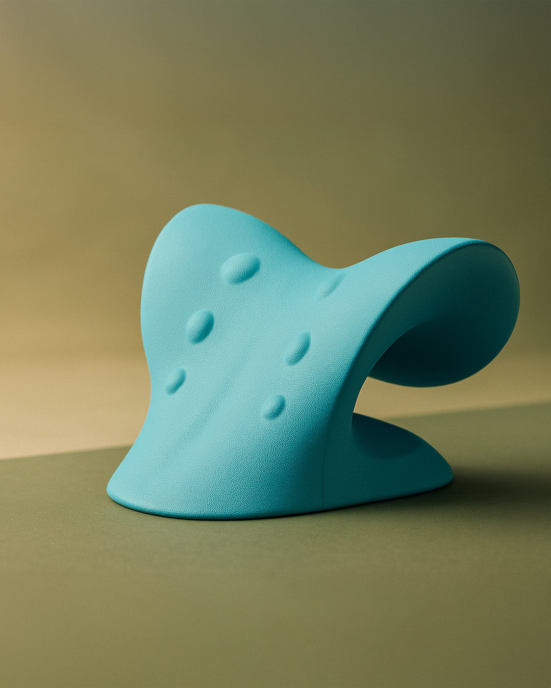 Blue massage pillow on a sage background