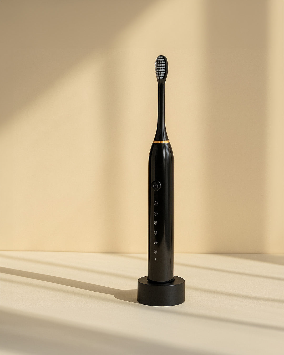 Black ultrasonic electric toothbrush on a beige background